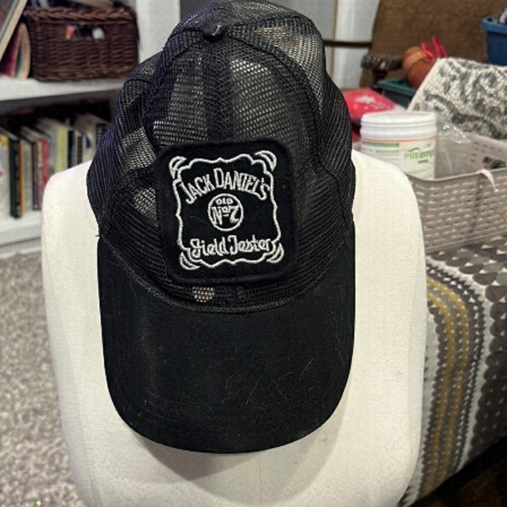 Jack Daniels. Old number seven. Field tester. Mesh trucker hot. Snapback. Black